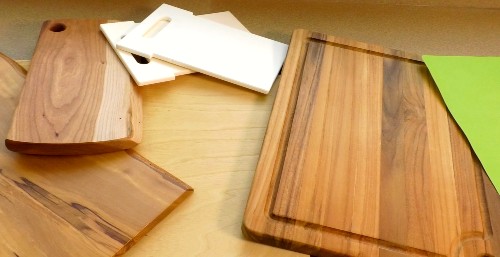 A Collection of Wooden and Plastic cutting boards